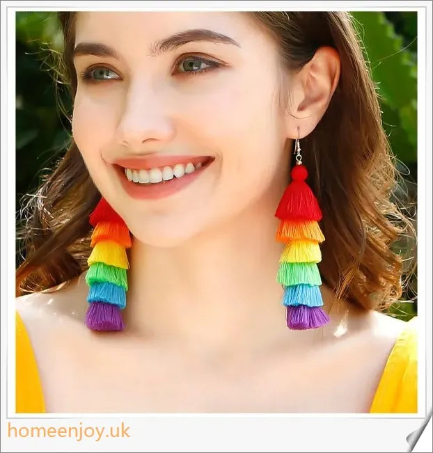 Vibrant bohemian-inspired tassel earrings in rainbow and rose colours, perfect for summer fashion and vacations