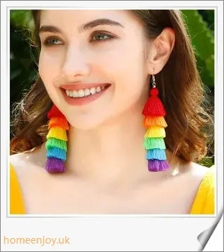 Vibrant bohemian-inspired tassel earrings in rainbow and rose colours, perfect for summer fashion and vacations