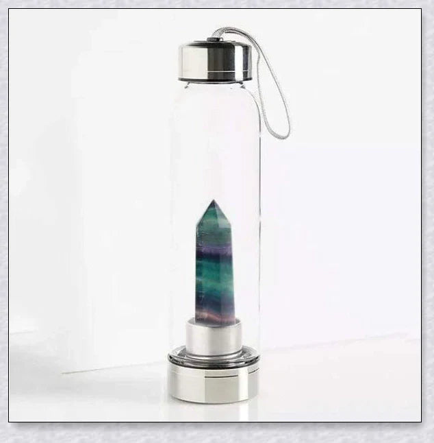 A handcrafted glass water bottle infused with natural crystals, offering a unique and sustainable hydration experience.