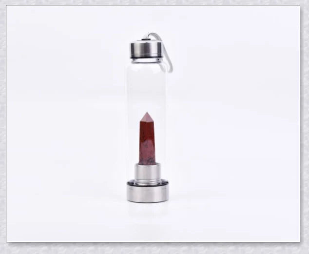 A handcrafted glass water bottle infused with natural crystals, offering a unique and sustainable hydration experience.