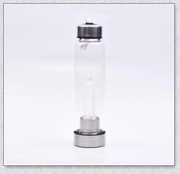 A handcrafted glass water bottle infused with natural crystals, offering a unique and sustainable hydration experience.