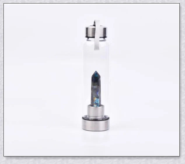 A handcrafted glass water bottle infused with natural crystals, offering a unique and sustainable hydration experience.