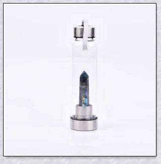 A handcrafted glass water bottle infused with natural crystals, offering a unique and sustainable hydration experience.