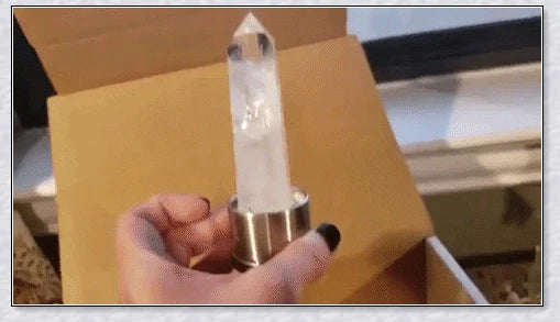 A handcrafted glass water bottle infused with natural crystals, offering a unique and sustainable hydration experience.