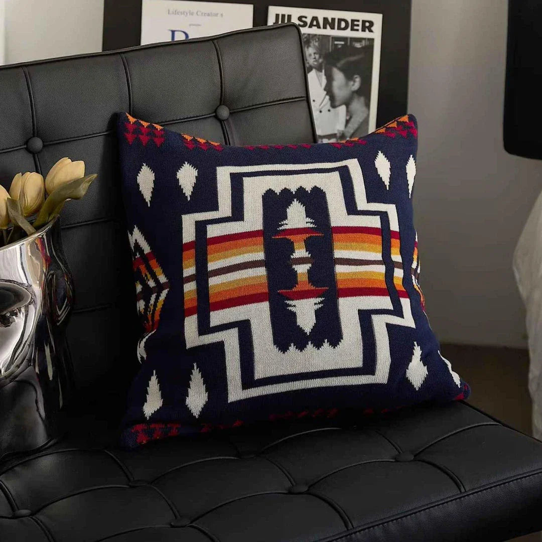 Geometric-patterned cushion cover made of soft, breathable 100% cotton
