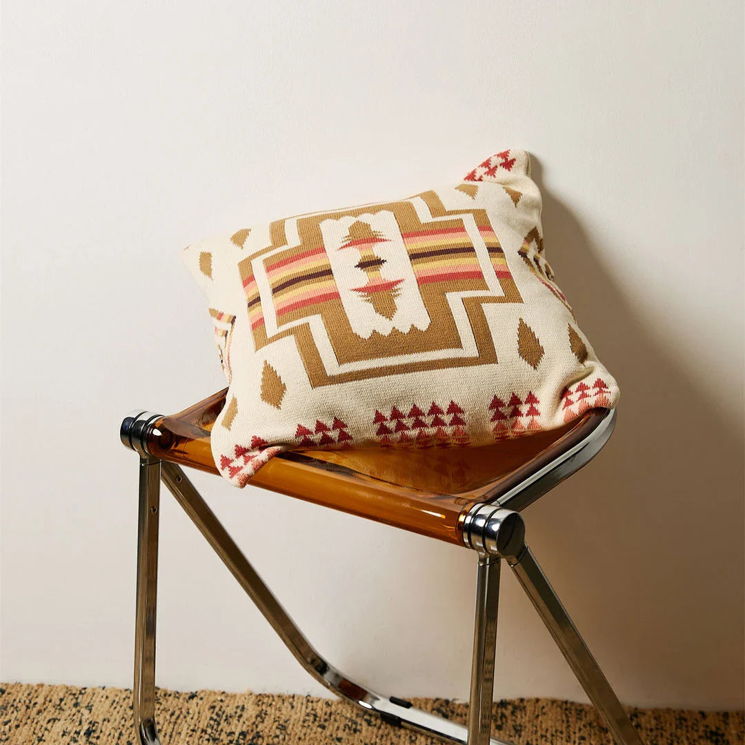 Geometric-patterned cushion cover made of soft, breathable 100% cotton