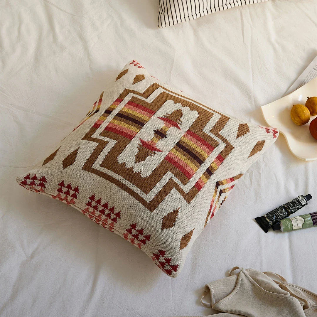 Geometric-patterned cushion cover made of soft, breathable 100% cotton