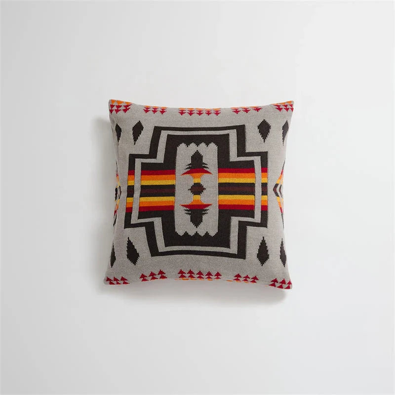 Geometric-patterned cushion cover made of soft, breathable 100% cotton