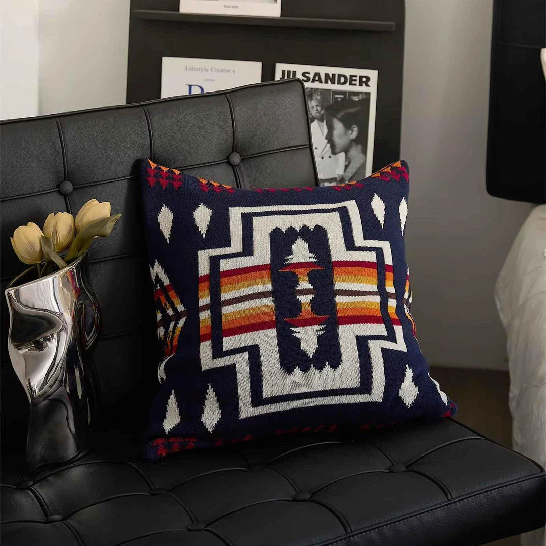 Geometric-patterned cushion cover made of soft, breathable 100% cotton