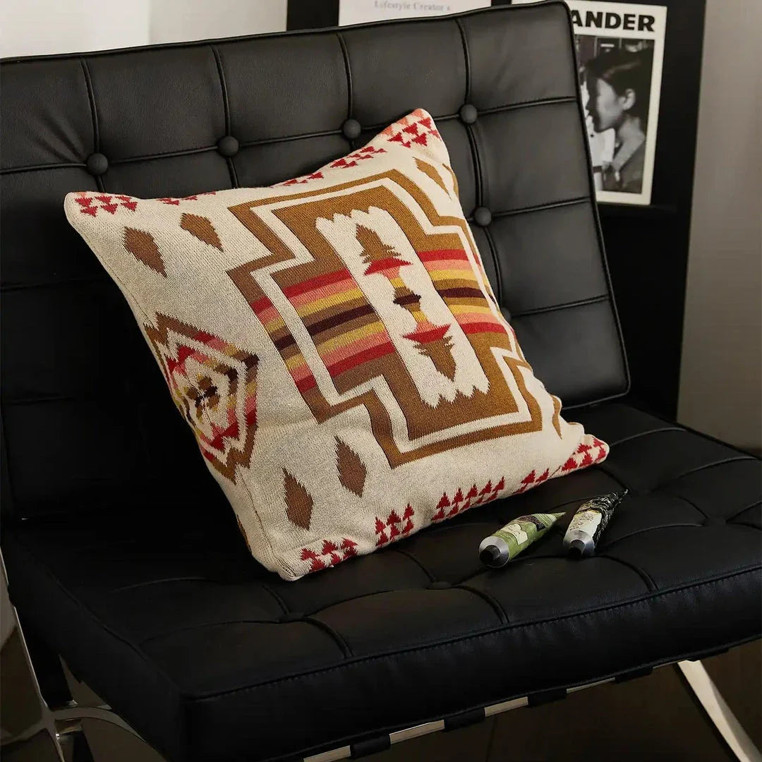 Geometric-patterned cushion cover made of soft, breathable 100% cotton