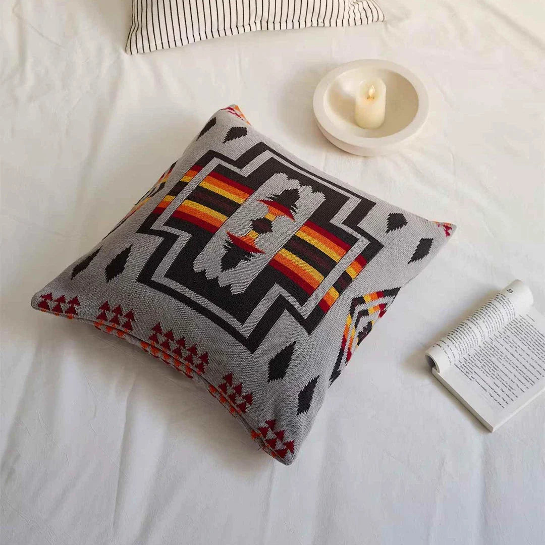 Geometric-patterned cushion cover made of soft, breathable 100% cotton