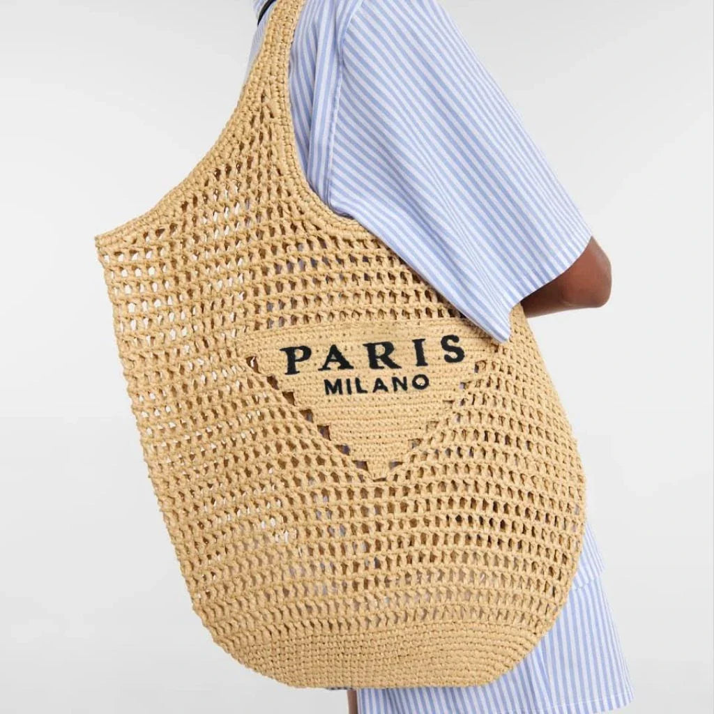 Luxury design women's plaited raffia straw bag in blue color, featuring a criss-cross pattern and large capacity for everyday use.