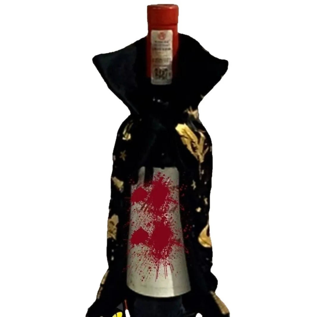 Two-tone cloth wine bottle cloak on a champagne bottle for Christmas decoration.
