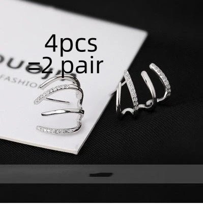 Pair of 925 sterling silver earrings with four-prong zircon stone settings in a geometric design