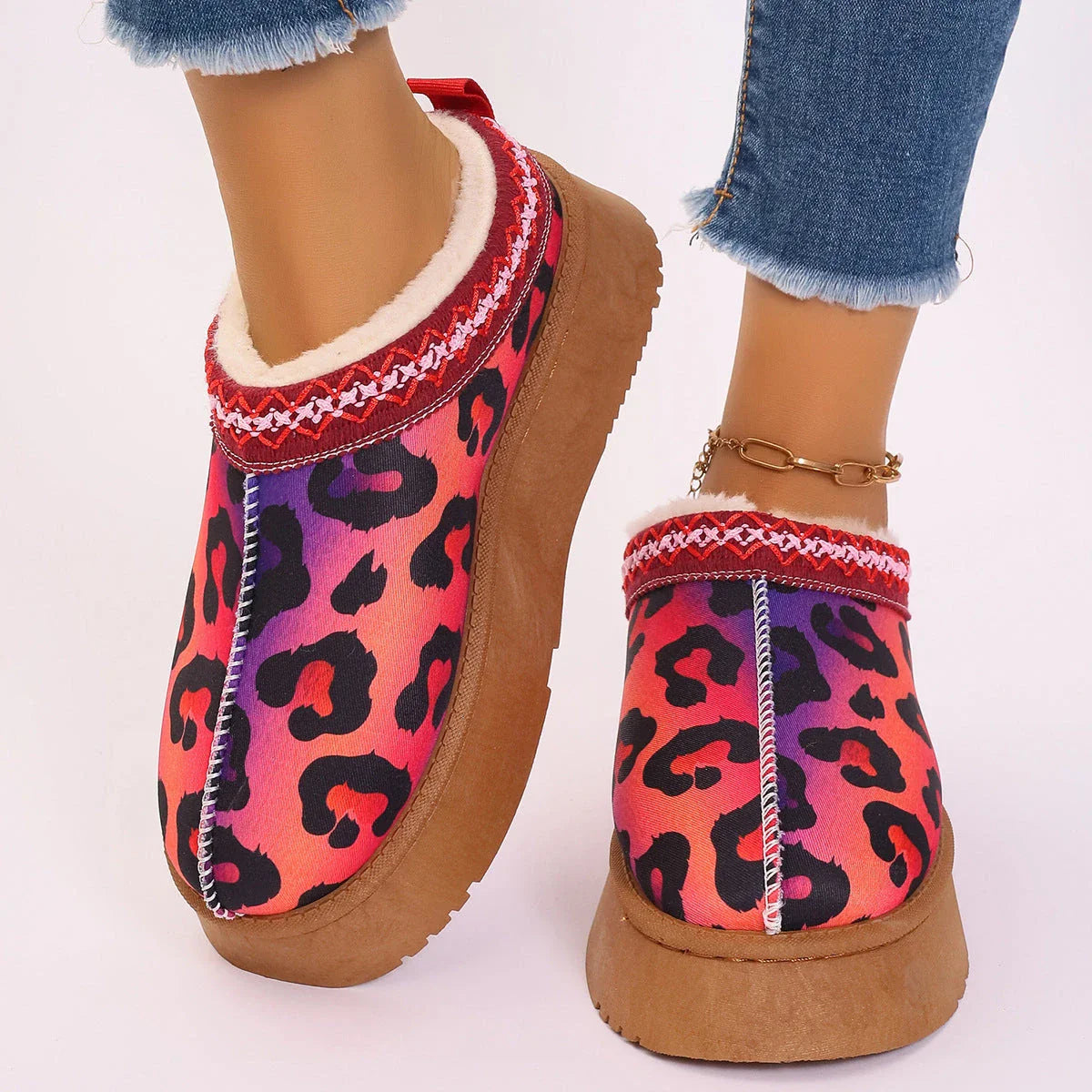 Cozy winter ankle boots featuring festive Christmas prints and plush lining for women