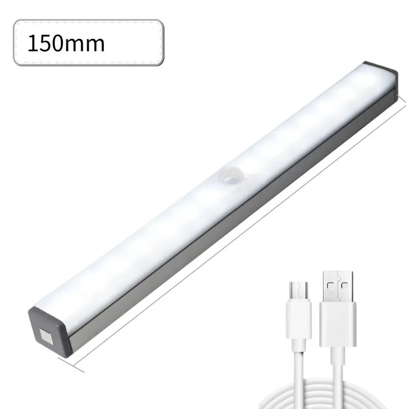 A matte aluminium LED closet light with a magnetic back, shown mounted inside a wooden wardrobe.