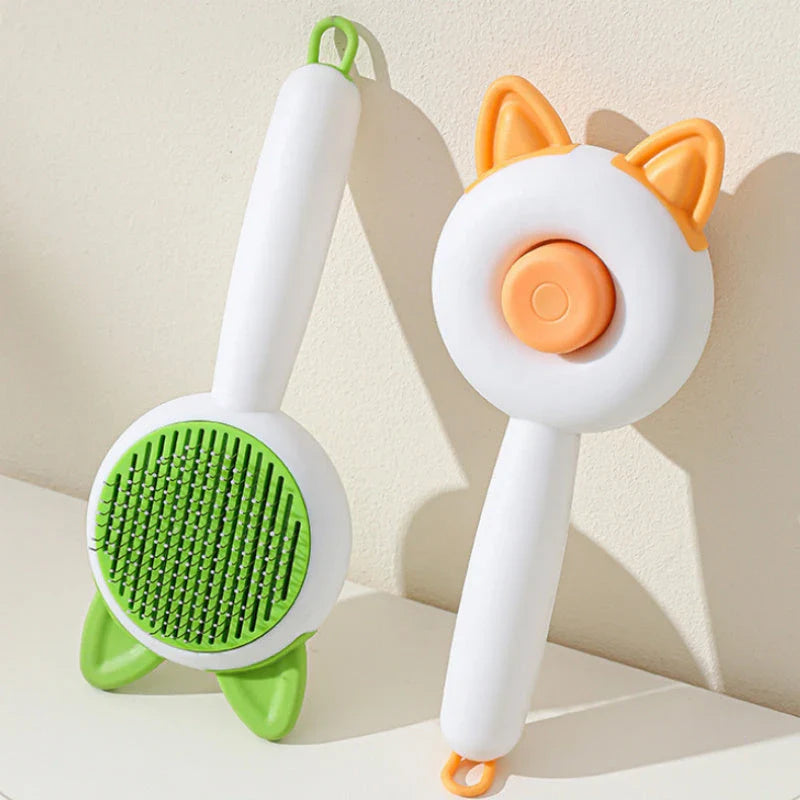 Dual-purpose pet grooming brush with self-cleaning design, available in greenish white and orange white colors