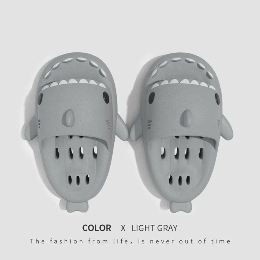 Stylish shark-themed shower slides with drainage holes and non-slip soles, made of lightweight and quick-drying EVA material