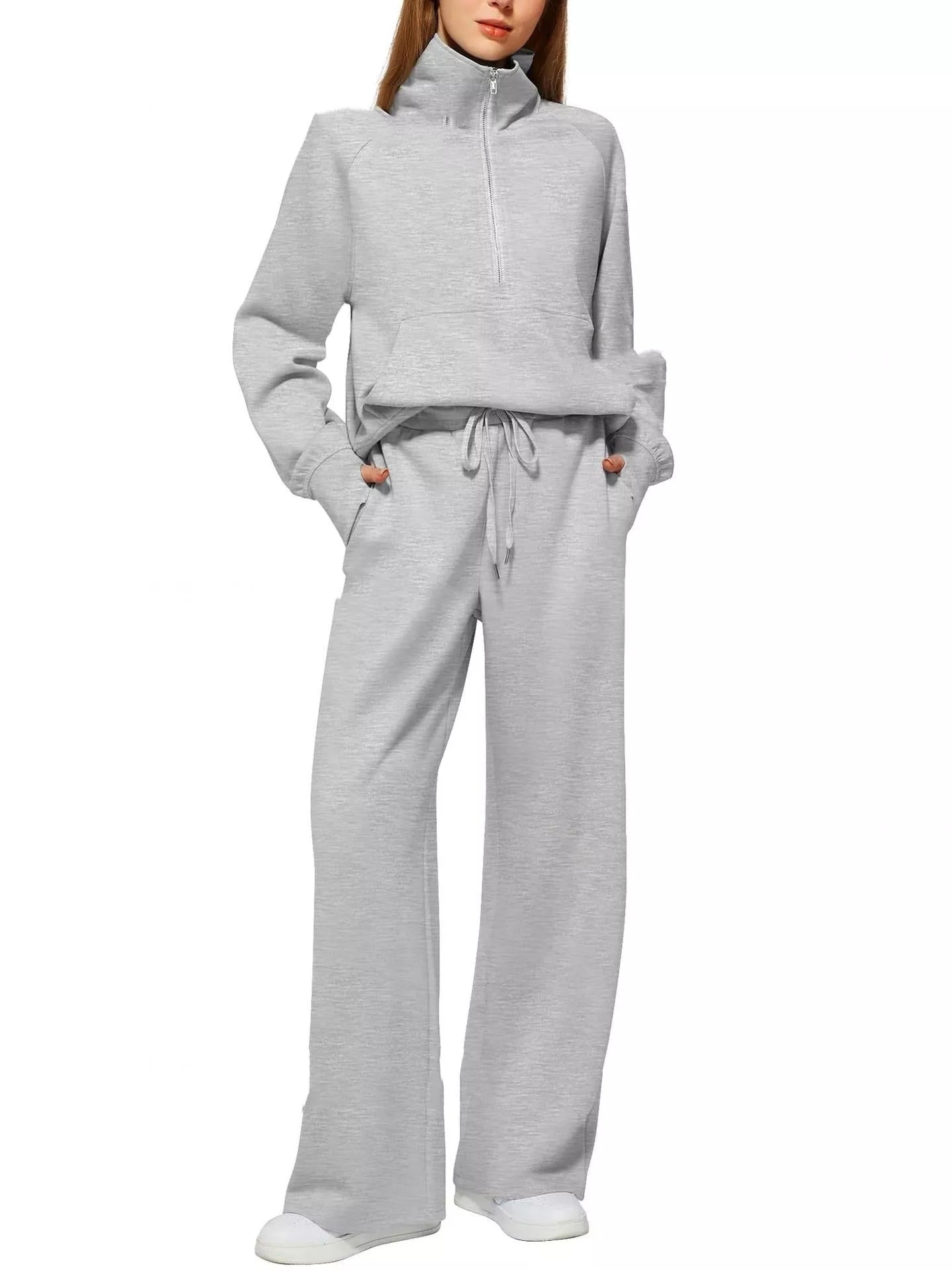 Women's solid colour long-sleeved sweater trousers suit in polyester, available in multiple colours and sizes.