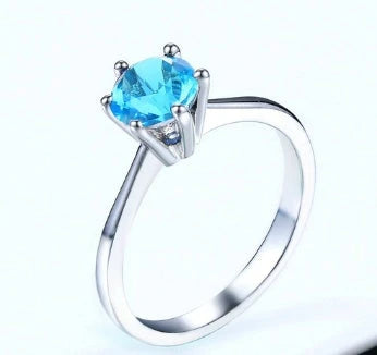 Close-up of a beautiful rose gold ring with sparkling zircon stones