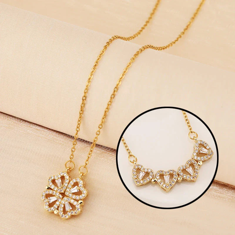 Elegant four-leaf clover pendant necklace made of premium titanium steel with a captivating diamond inlay design