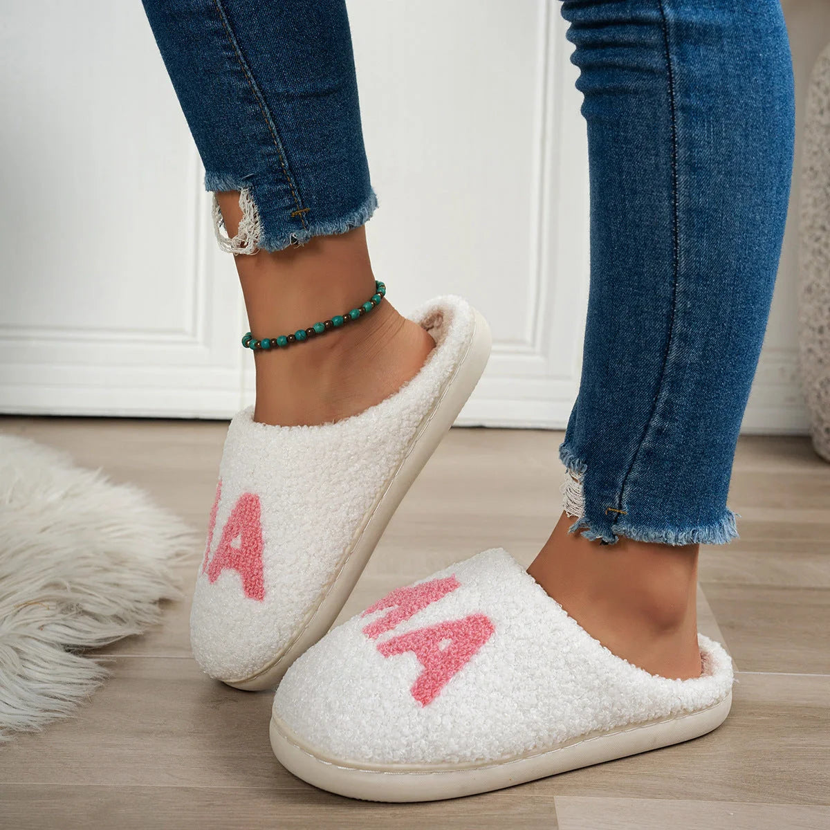 Cosy and comfortable women's Christmas gift slippers with plush cotton upper and thick non-slip sole
