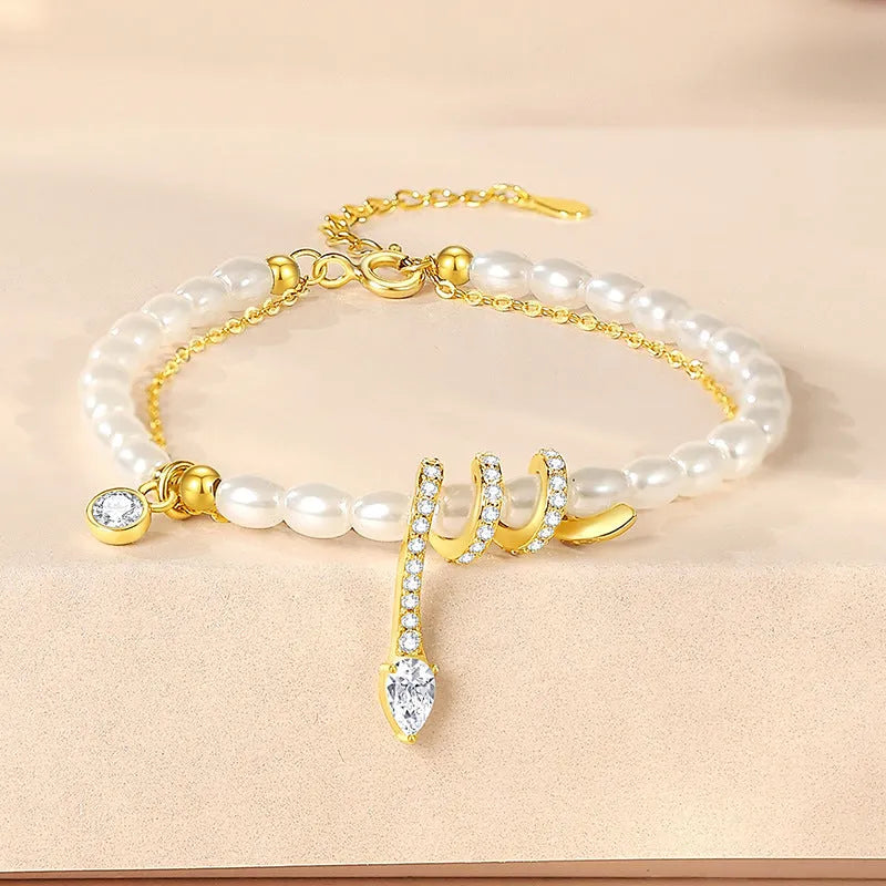 Women's 925 silver snake zodiac bracelet with geometric beads in gold or white gold colour.