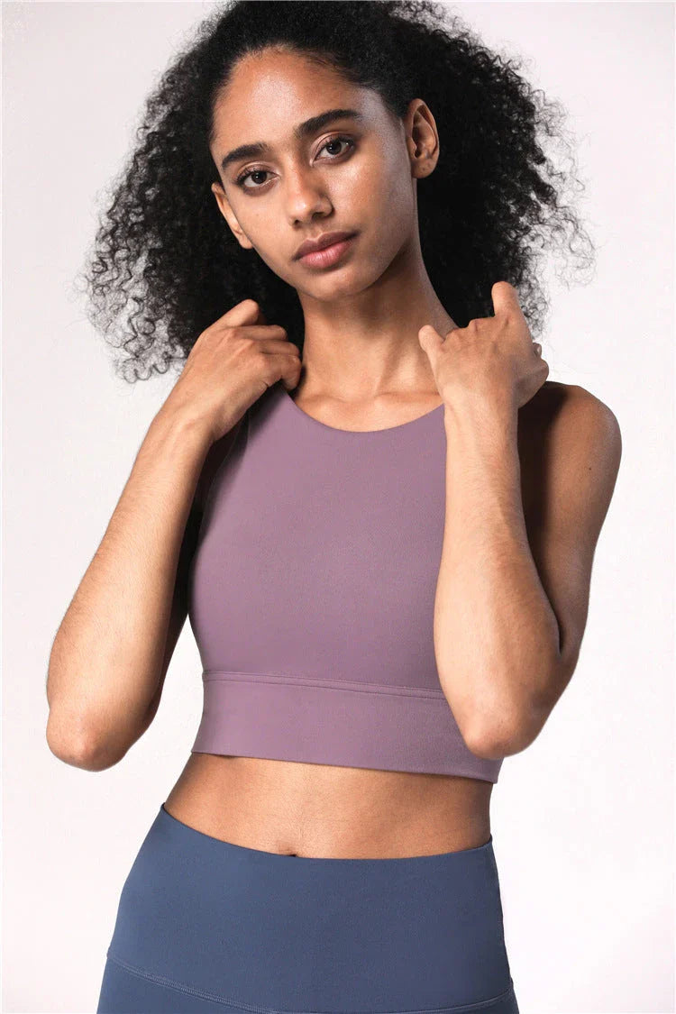 Versatile Fitness Sports Bra with Strappy Design and Customizable Support