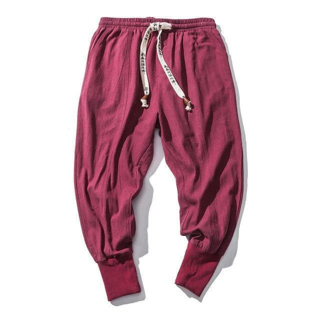 Men's harem trousers made of soft cotton and linen, featuring an elastic waistband and relaxed silhouette for all-day comfort.