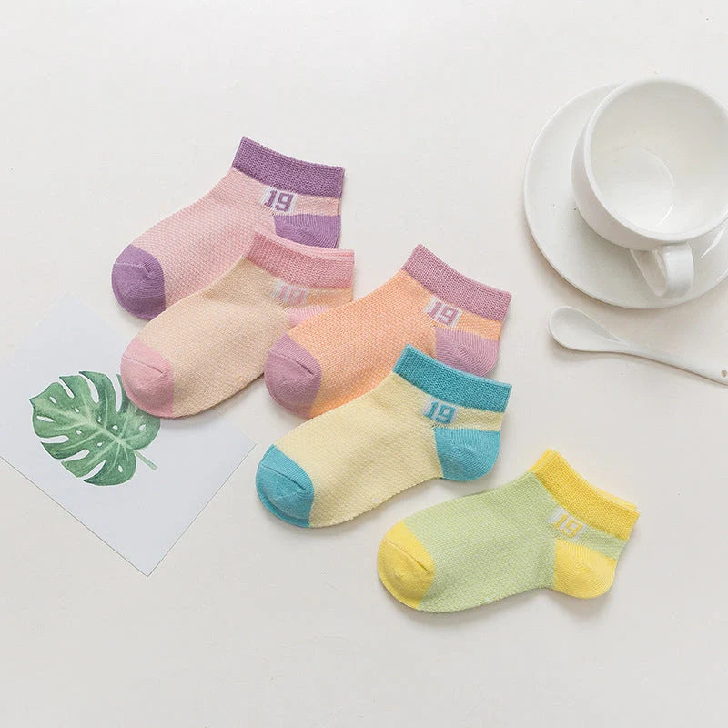 Cotton breathable baby socks in various colours and sizes