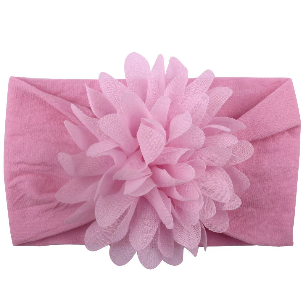 Handcrafted chiffon flower baby headband for little princesses, available in various colours and styles.