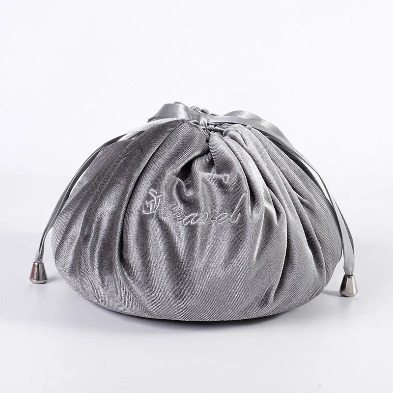 Adorable rabbit ear velvet cosmetic bags in various colors for storing and organizing makeup, toiletries, and other beauty essentials.