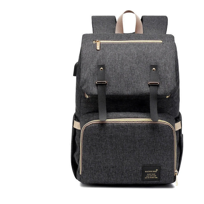Stylish and functional diaper backpack with large capacity, stroller hooks, and USB charging port for modern parents
