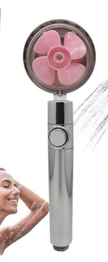 A high-pressure handheld shower head with a turbo-charged water flow and a cotton filter for a luxurious, spa-like bathing experience.