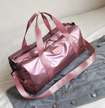 Premium, durable, and waterproof gym bag with multiple compartments and adjustable straps for organized fitness and travel