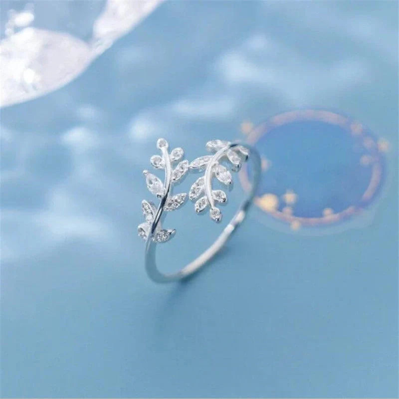 Women's branch ring with leaf design in silver or gold electroplated finish