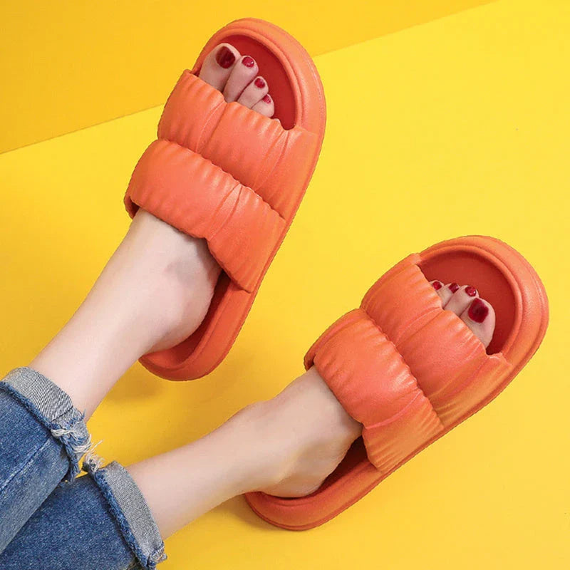 Stylish and comfortable bathroom slippers with a variety of vibrant color options, featuring a durable, waterproof, and anti-slip sole for all-day wear.
