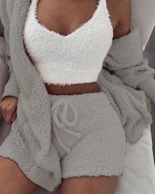 A cozy 3-piece loungewear set featuring a long sleeve crop top and drawstring shorts in a variety of stylish colors.