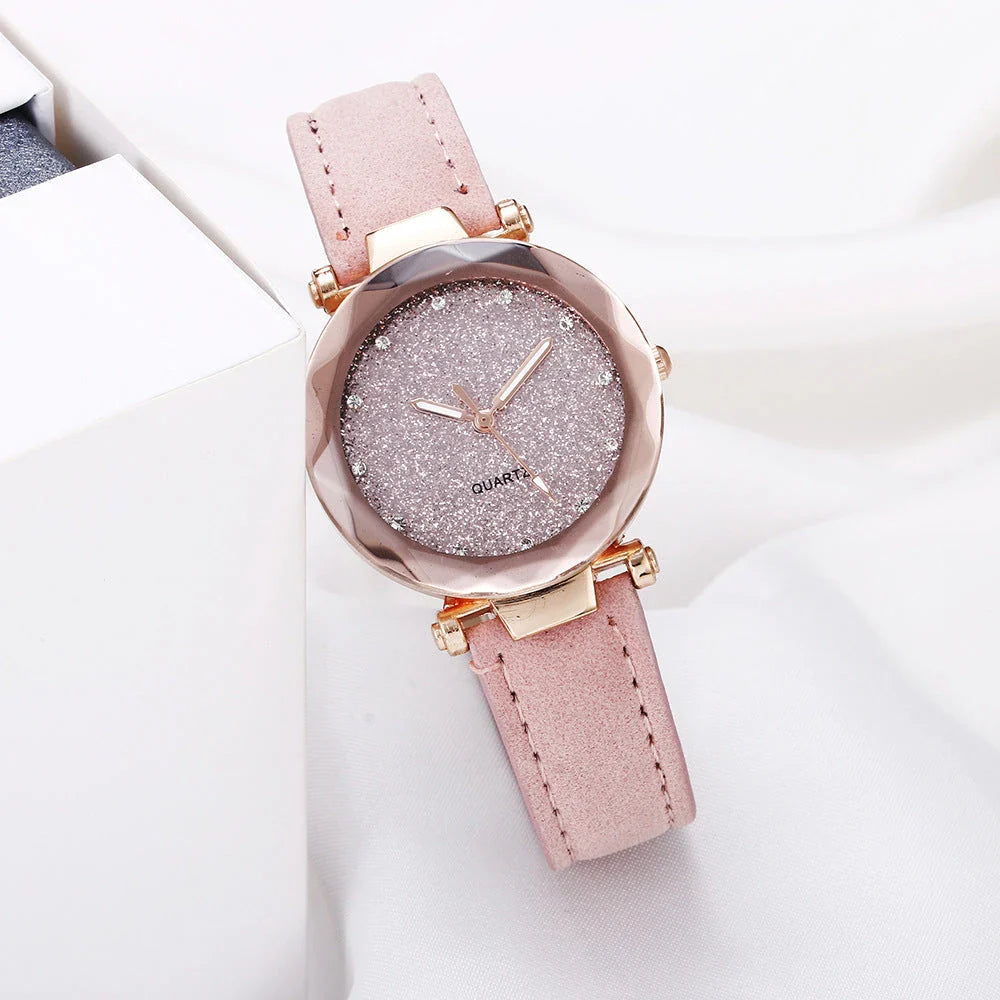 Elegant women's wrist watch with a captivating starry sky dial and leather strap, suitable for any occasion.