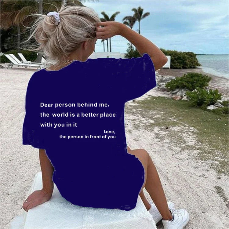 Stylish women's graphic t-shirt with trendy slogan, featuring a vibrant print design and comfortable short sleeve silhouette.