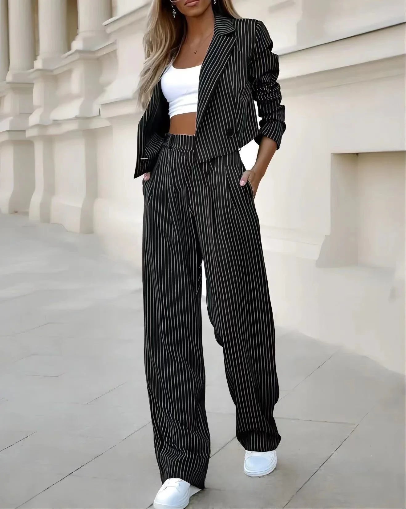 Stylish striped two-piece outfit featuring a cropped top and straight-leg pants in a variety of colors