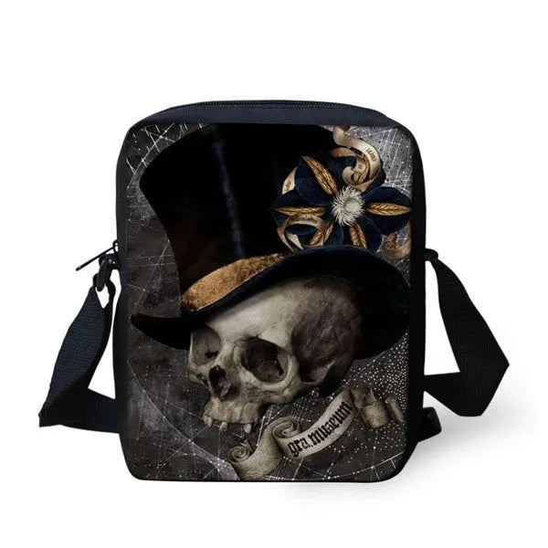 Skull print children's messenger bag with adjustable double straps and zipper closure, shown in a casual setting.