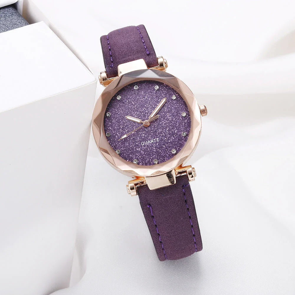 Elegant women's wrist watch with a captivating starry sky dial and leather strap, suitable for any occasion.