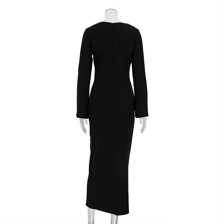 Elegant crossbody dress with zipper detail, high-waisted silhouette, and long sleeves in a solid black colour