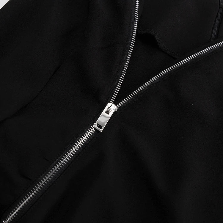 Elegant crossbody dress with zipper detail, high-waisted silhouette, and long sleeves in a solid black colour