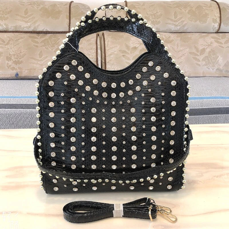 Fashionable diamond-studded messenger bag with shimmering PU leather surface, versatile carrying options, and practical organisational features