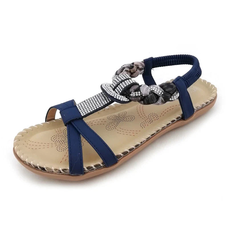 Low-top toe sandals with two-layer leather upper, raw rubber sole, and rhinestone detailing
