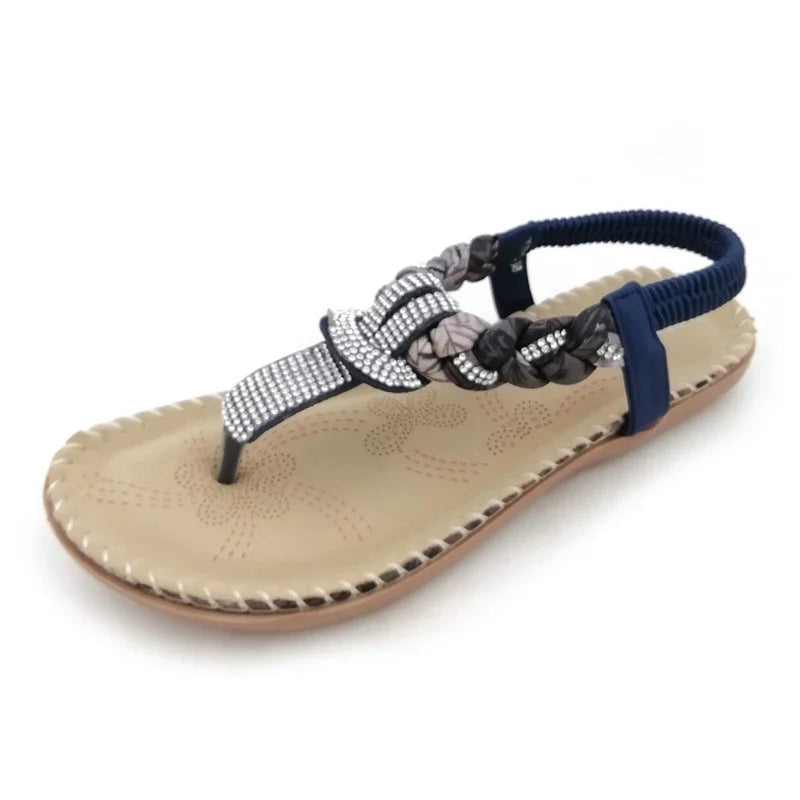 Low-top toe sandals with two-layer leather upper, raw rubber sole, and rhinestone detailing