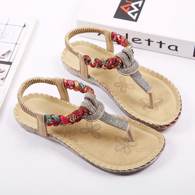 Low-top toe sandals with two-layer leather upper, raw rubber sole, and rhinestone detailing