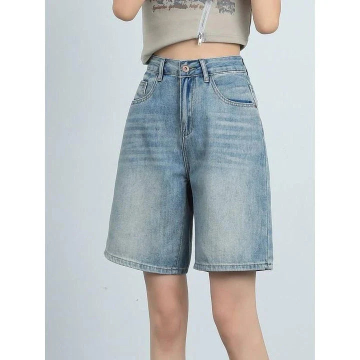 High-waist knee-length denim shorts for women, featuring a flattering silhouette and versatile casual style.